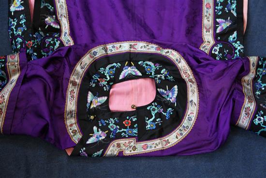 A Chinese embroidered purple satin robe, drop 4ft 6in approx.